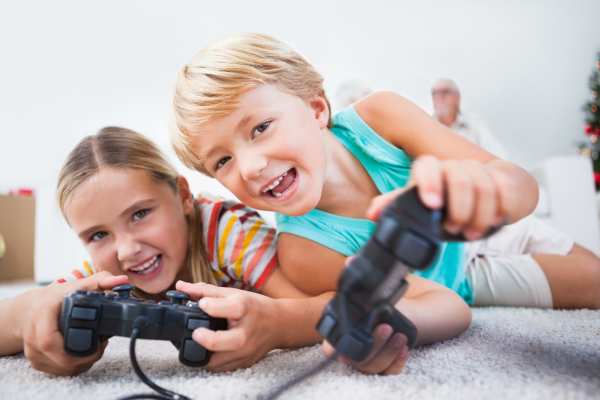 Foster children playing video games
